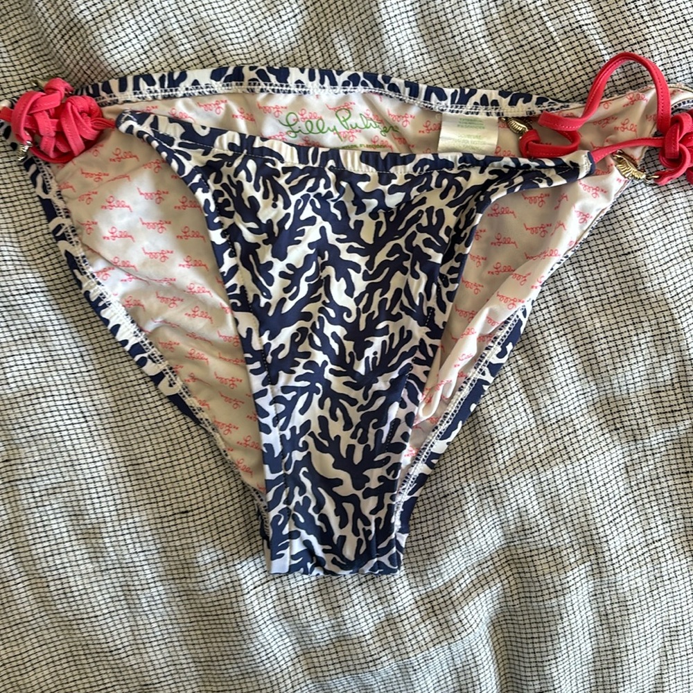 Lilly Pulitzer size small bathing suit bottoms with sea horse hem on ties